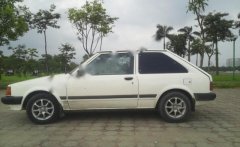 Mazda 323 1990 - Xe Mazda 323 đời 1990, màu xanh lam, nhập khẩu nguyên chiếc giá 62 triệu tại Hà Nội