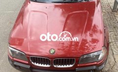 Cần bán BMW X3 AT đời 2004, màu đỏ, nhập khẩu còn mới, giá tốt giá 320 triệu tại Tp.HCM
